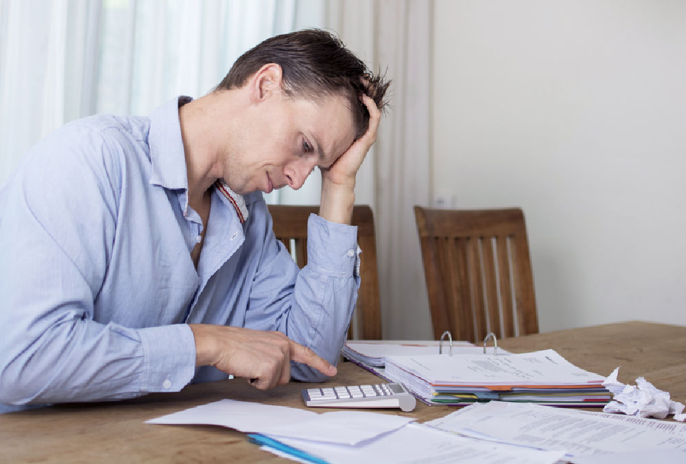 How Much Debt Do I Have to File Bankruptcy?